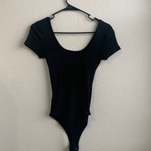 All black bodysuit low neck